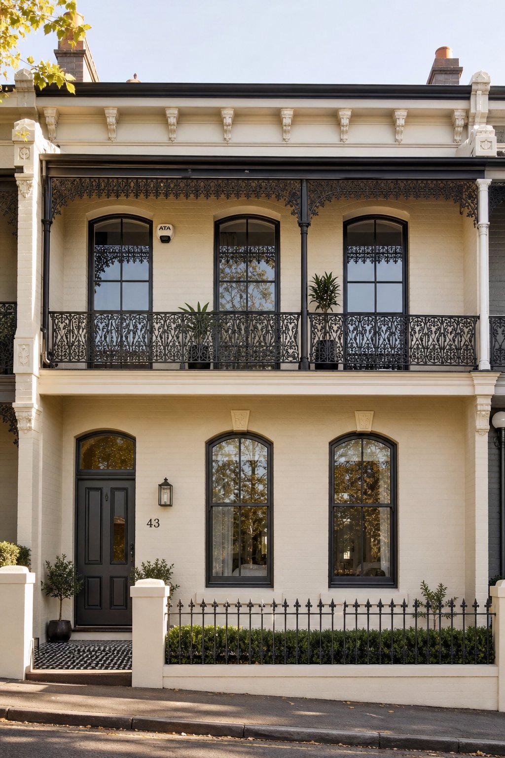 heritage victorian terrace with segmental arched aluminium windows replicating period proportions