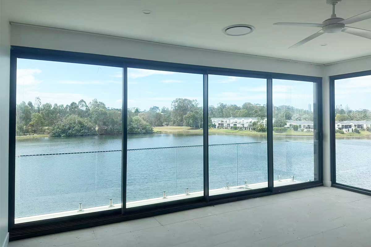 well maintained aluminium window on an established coastal australian home demonstrating long term durability of quality powder coated finishes