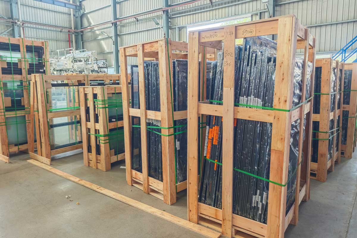 aluminium window fabrication facility with cnc machinery producing standard sized frames for volume orders