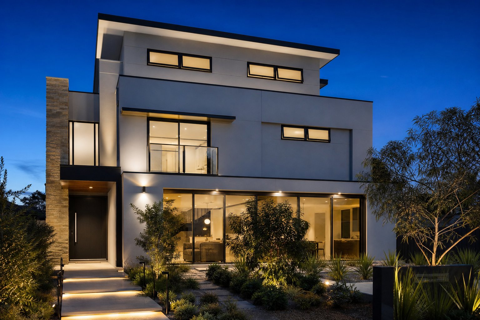 contemporary australian home showcasing aluminium windows across multiple levels from expansive glazing to compact privacy windows