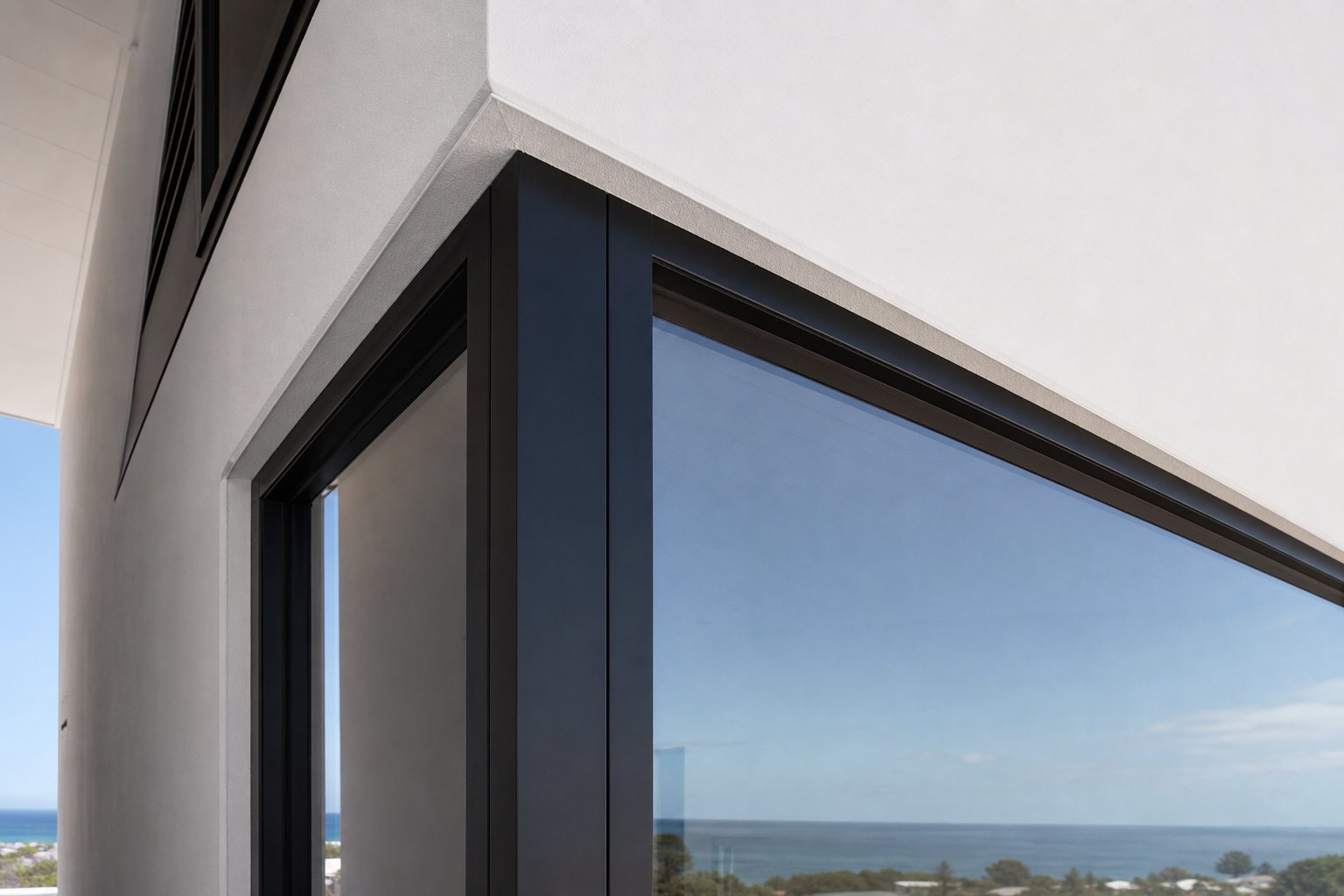 thermally broken aluminium window frame detail showing the slim profile and precision installation finish