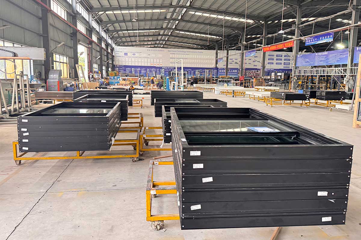 inside an aluminium window manufacturing facility where bulk production enables competitive pricing for project scale orders