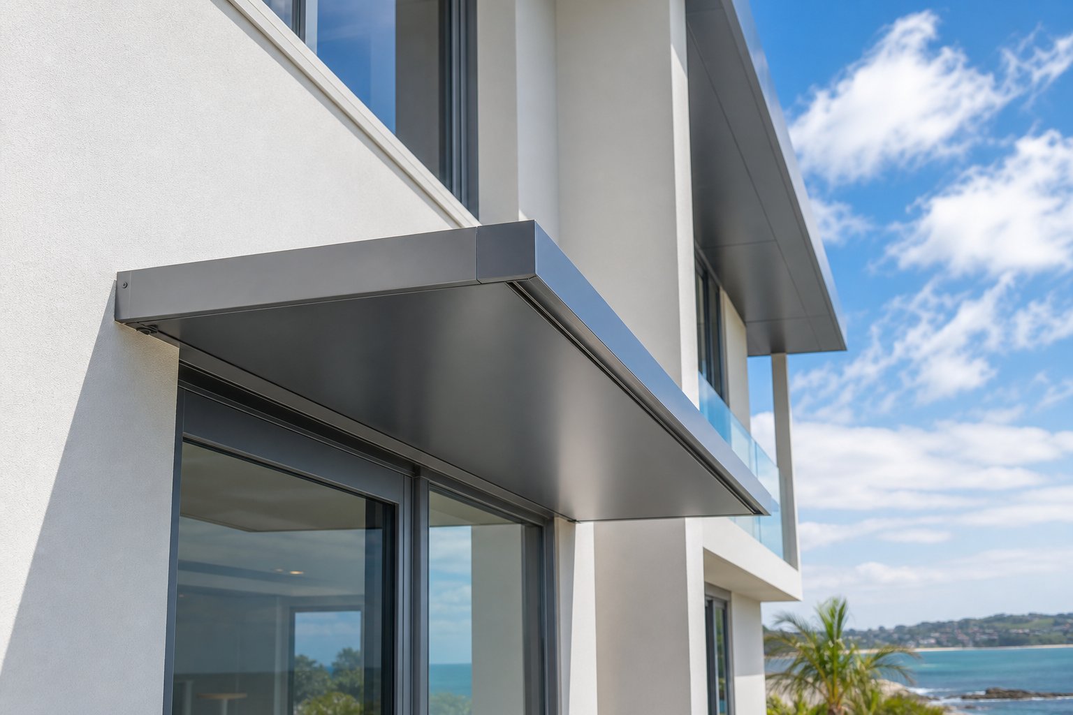 well maintained powder coated aluminium canopy showing clean lines and concealed drainage on a coastal home