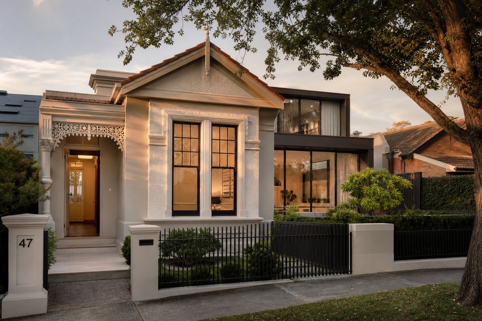 aluminium double hung windows with heritage appropriate glazing bars on a renovated federation home