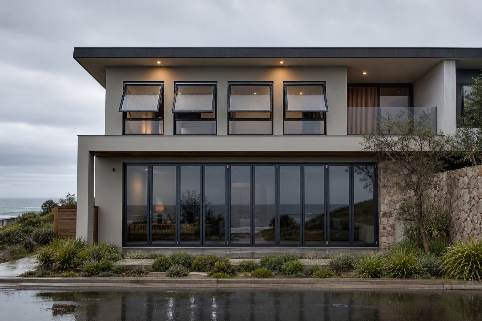 coastal home featuring multiple aluminium window styles configured for weather protection and ventilation
