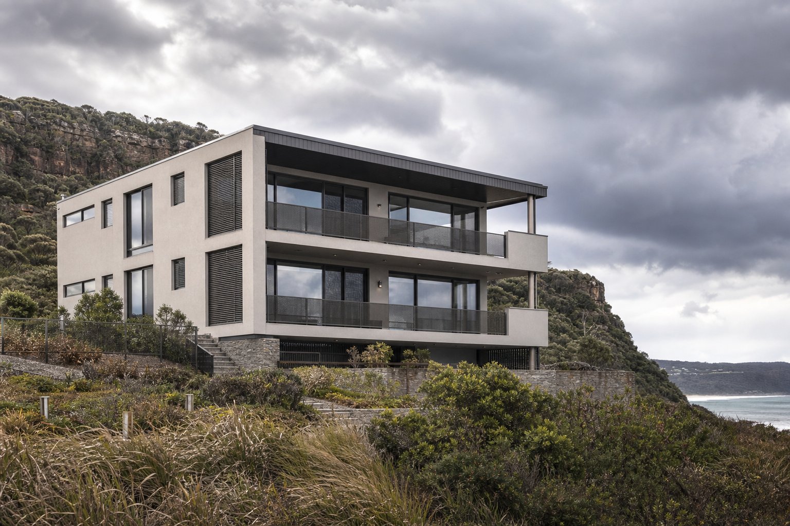 aluminium windows on an escarpment adjacent wollongong property built to meet bushfire and wind rating requirements